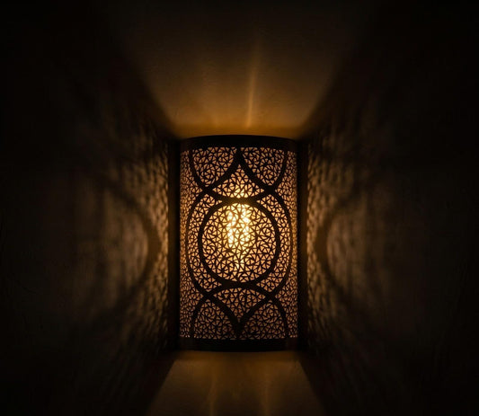 Handmade Moroccan Brass Cylinder Wall Sconce – Pierced Geometric Wall Light with Circular Arabesque Pattern, Warm Golden Glow and Dramatic Shadow Projection