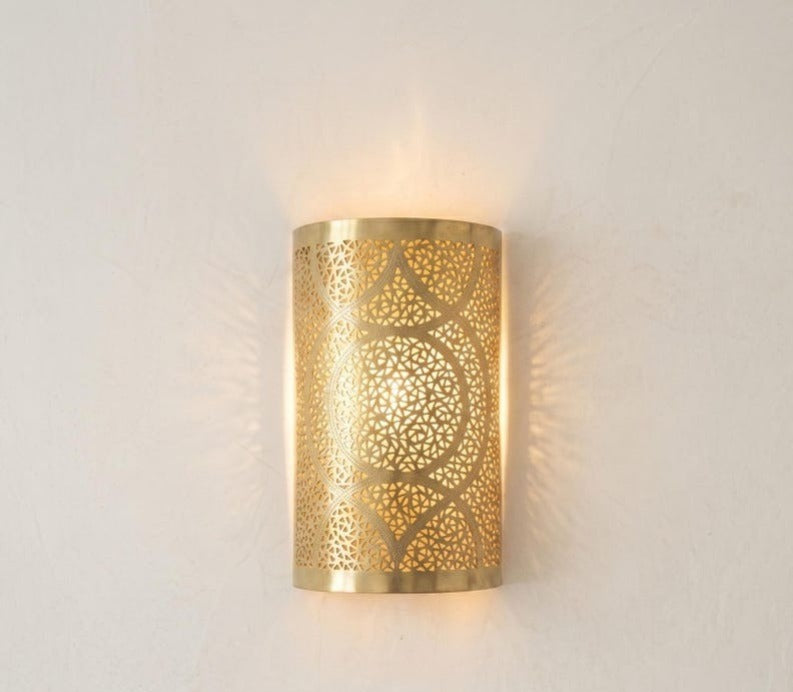 Handmade Moroccan Brass Cylinder Wall Sconce – Pierced Geometric Wall Light with Circular Arabesque Pattern, Warm Golden Glow and Dramatic Shadow Projection