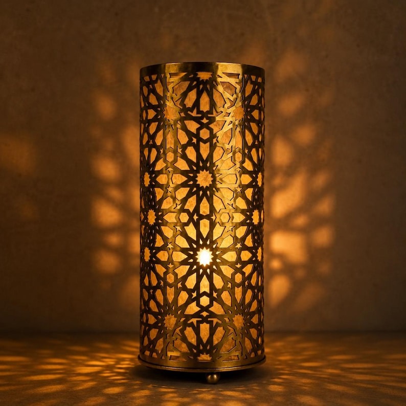 Handmade Moroccan Brass Cylinder Table Lamp – Pierced Geometric Star Lantern with Warm Gold Glow and Dramatic Moorish Shadow Patterns for Bedroom, Living Room & Entryway