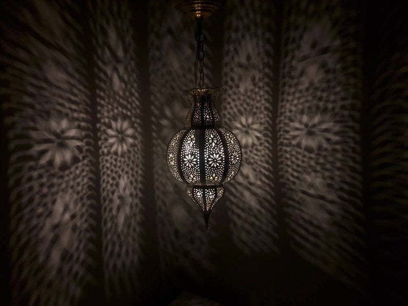 Handmade Moroccan Brass Lantern Pendant Light – Pierced Globe Hanging Lamp with Floral Arabesque Cutouts, Antique Gold Finish and Dramatic Shadow Patterns