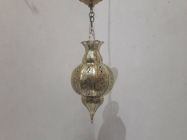 Handmade Moroccan Brass Lantern Pendant Light – Pierced Globe Hanging Lamp with Floral Arabesque Cutouts, Antique Gold Finish and Dramatic Shadow Patterns