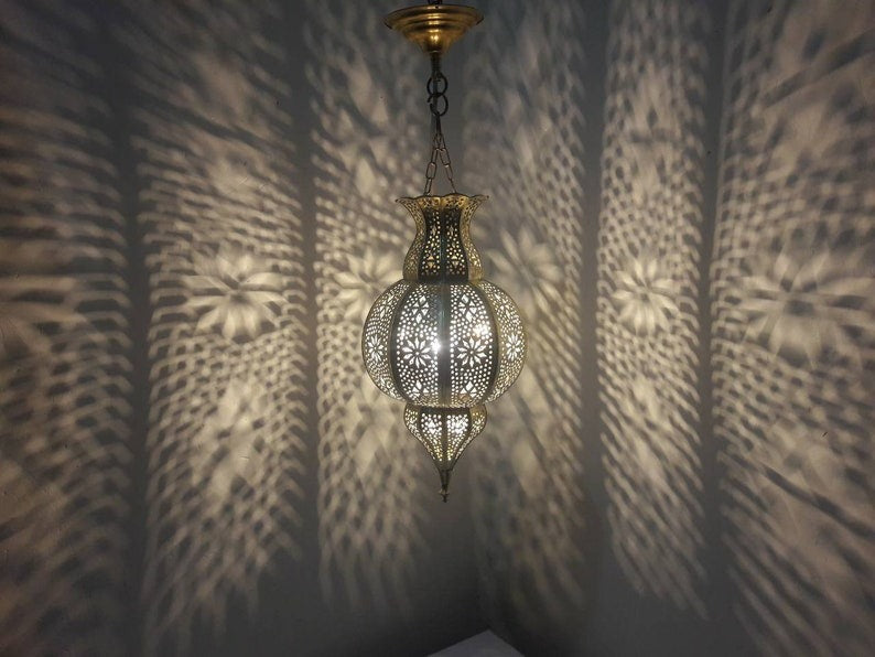 Handmade Moroccan Brass Lantern Pendant Light – Pierced Globe Hanging Lamp with Floral Arabesque Cutouts, Antique Gold Finish and Dramatic Shadow Patterns