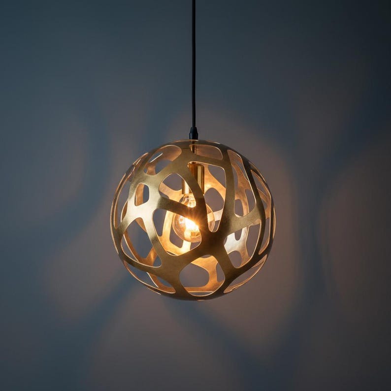 Sculptural Brass Globe Pendant Light – Organic Cutout Moroccan Chandelier with Shadow Pattern