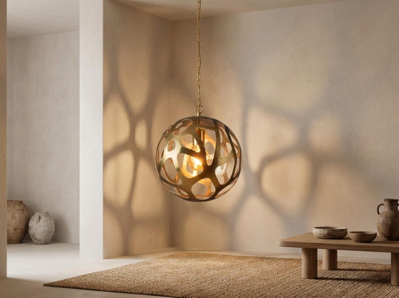 Sculptural Brass Globe Pendant Light – Organic Cutout Moroccan Chandelier with Shadow Pattern