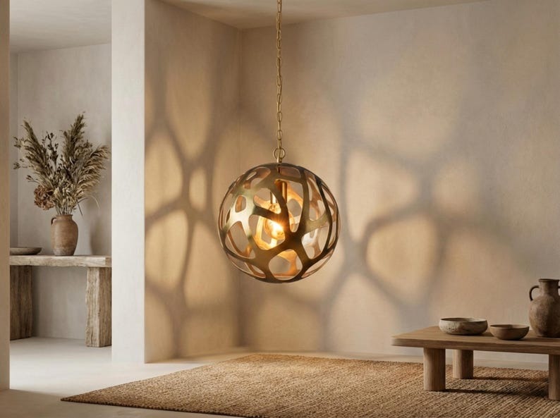 Sculptural Brass Globe Pendant Light – Organic Cutout Moroccan Chandelier with Shadow Pattern