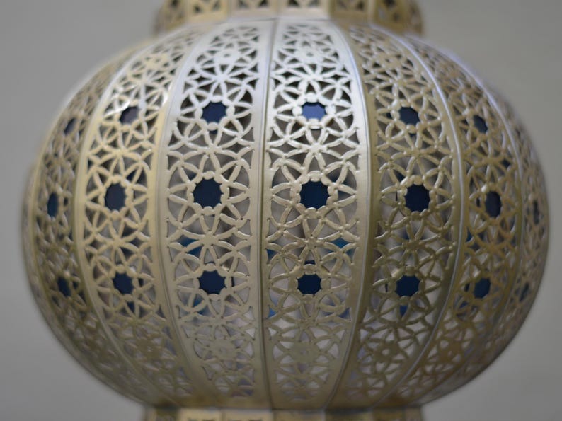 Handmade Moroccan Brass Lantern Pendant Light – Ornate Pierced Globe Hanging Lamp with Blue Glass Accents and Dramatic Moorish Shadow Patterns for Entryway, Bedroom & Living Room