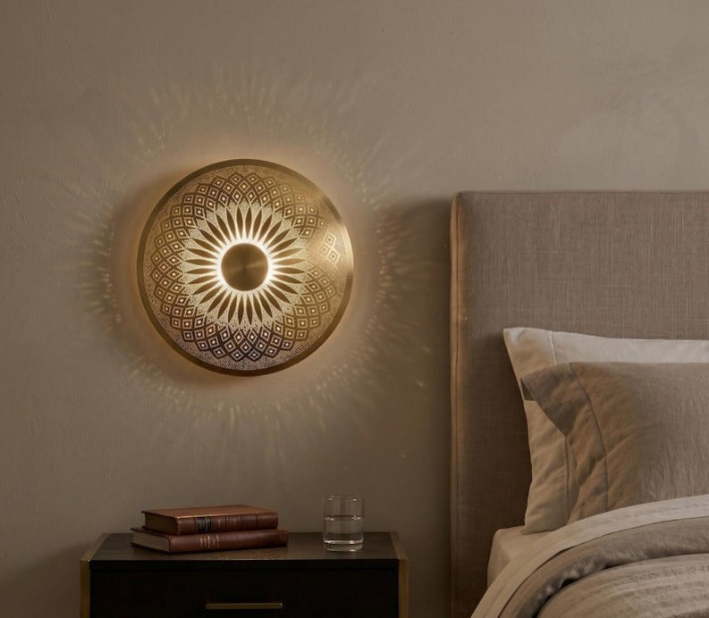 Handmade Moroccan Brass Round Wall Sconce – Pierced Sunburst Mandala Light with Geometric Diamond Patterns, Warm Golden Halo and Decorative Shadow Glow