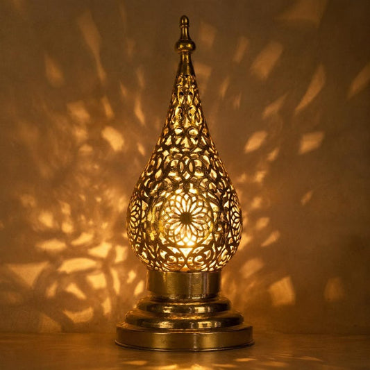 Handmade Moroccan Brass Teardrop Table Lamp – Ornate Pierced Brass Lantern with Floral Arabesque Cutouts, Warm Gold Glow and Dramatic Shadow Patterns