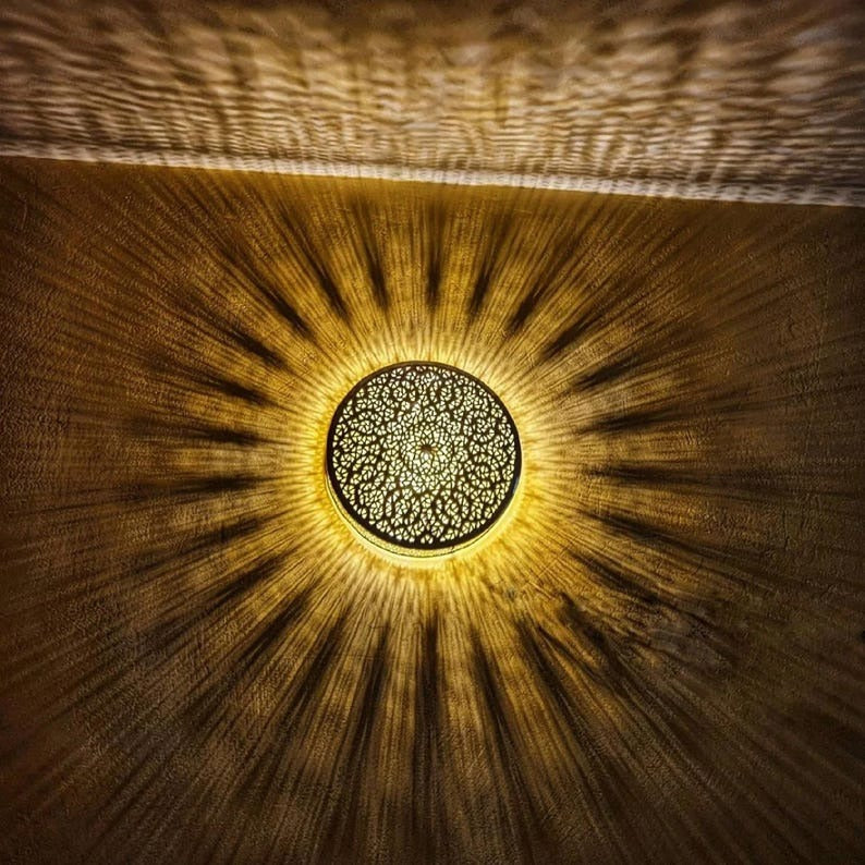Handmade Moroccan Brass Round Wall Sconce – Pierced Mandala Disc Light with Radiating Sunburst Shadows for Bedroom, Hallway, Entryway & Living Room
