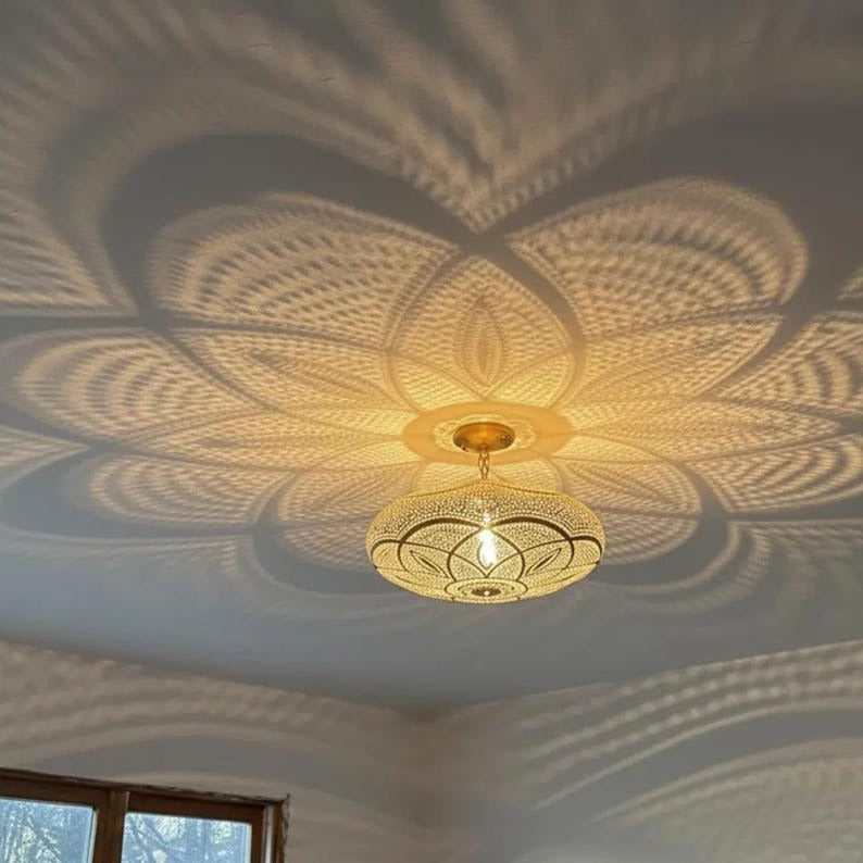 Handmade Moroccan Brass Disc Pendant Light – Pierced Floral Mandala Hanging Lantern with Chain Suspension and Dramatic Ceiling Shadow Patterns for Dining Room, Bedroom & Entryway