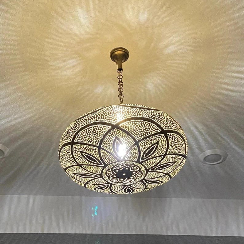 Handmade Moroccan Brass Disc Pendant Light – Pierced Floral Mandala Hanging Lantern with Chain Suspension and Dramatic Ceiling Shadow Patterns for Dining Room, Bedroom & Entryway